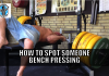 how to spot someone bench pressing